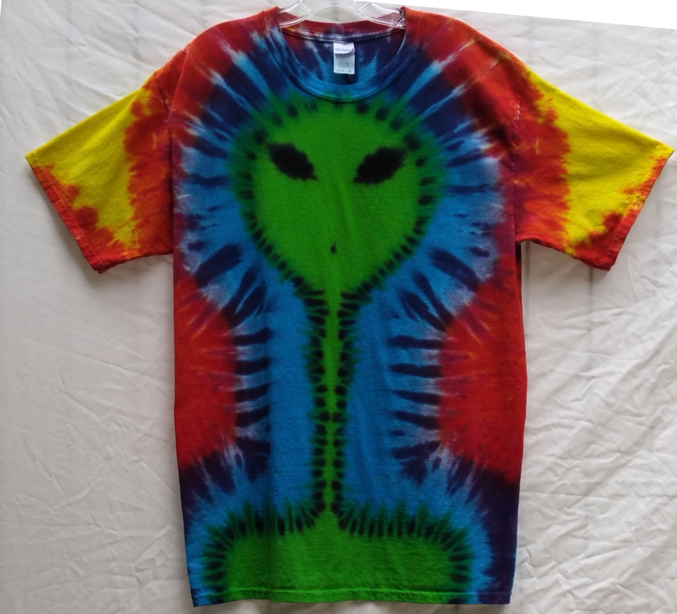 Just try not flying your saucer while sporting your Rainbow Long Neck Alien tiedye Tee! 
